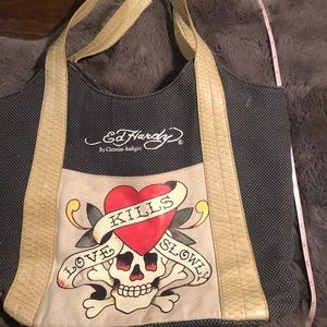 Ed Hardy original bag. Used but looks like new
